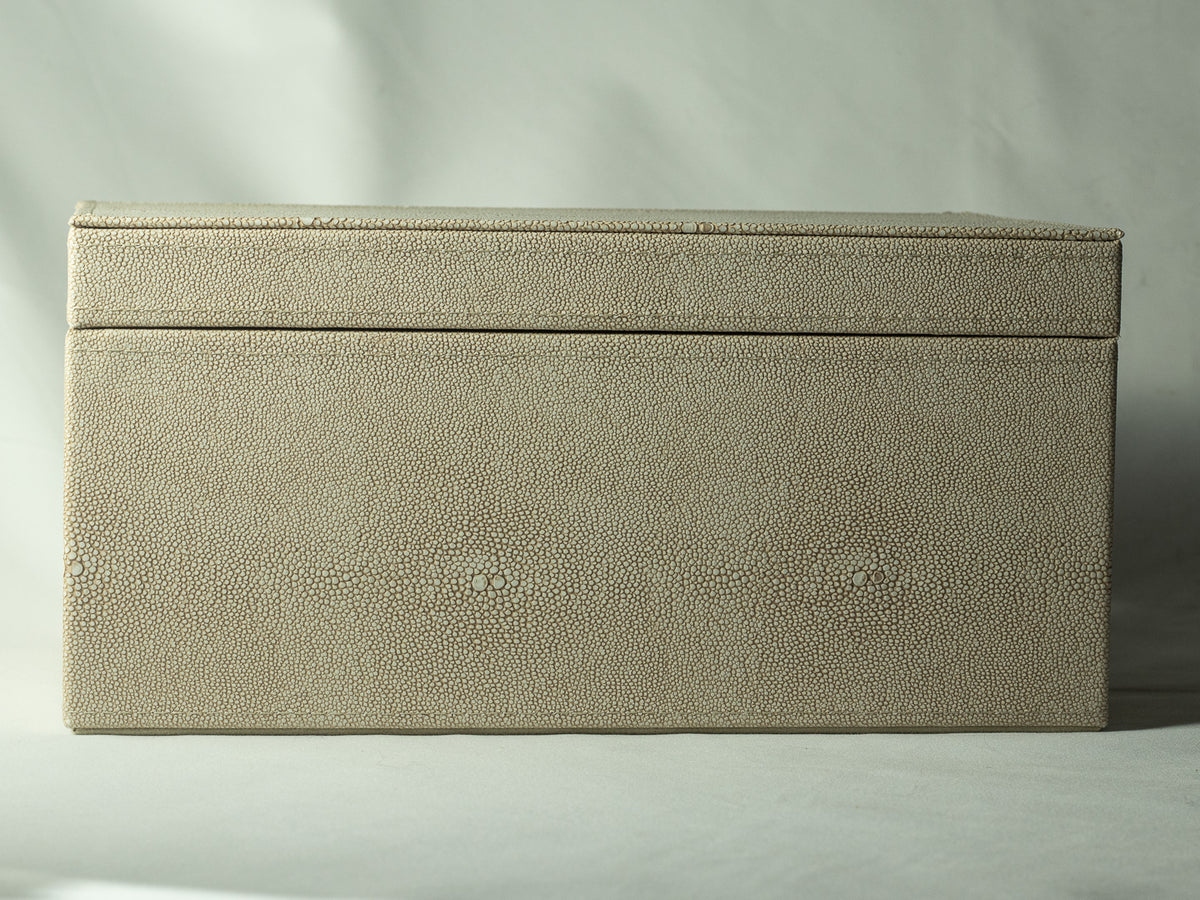 Cream faux leather keepsake box with a softly lined interior, photographed on a neutral background.