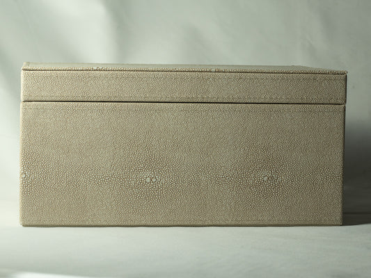 Cream faux leather keepsake box with a softly lined interior, photographed on a neutral background.