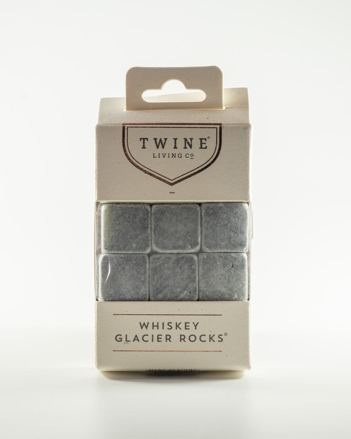Reusable granite whiskey stones in a gift box for chilling whiskey, bourbon, or cocktails without watering down drinks.