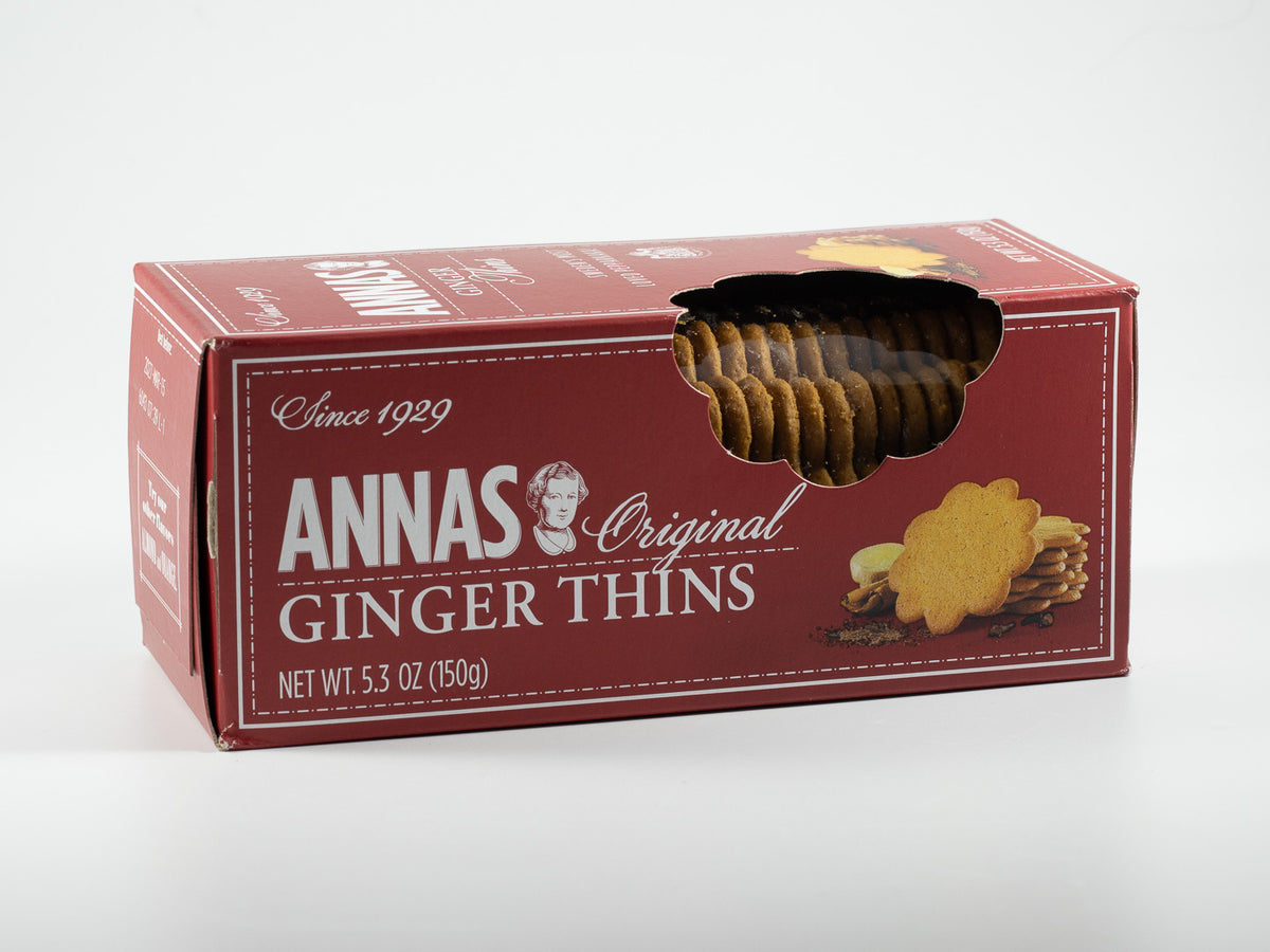 Box of Annas Original Ginger Thins cookies in red packaging with cookies visible through the front window.
