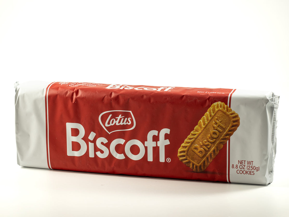 Package of classic Lotus Biscoff cookies on a soft white background.
