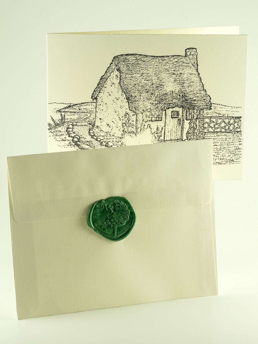 Hand-stamped Irish Daisy cottage note card with cream envelope and green wax seal.
