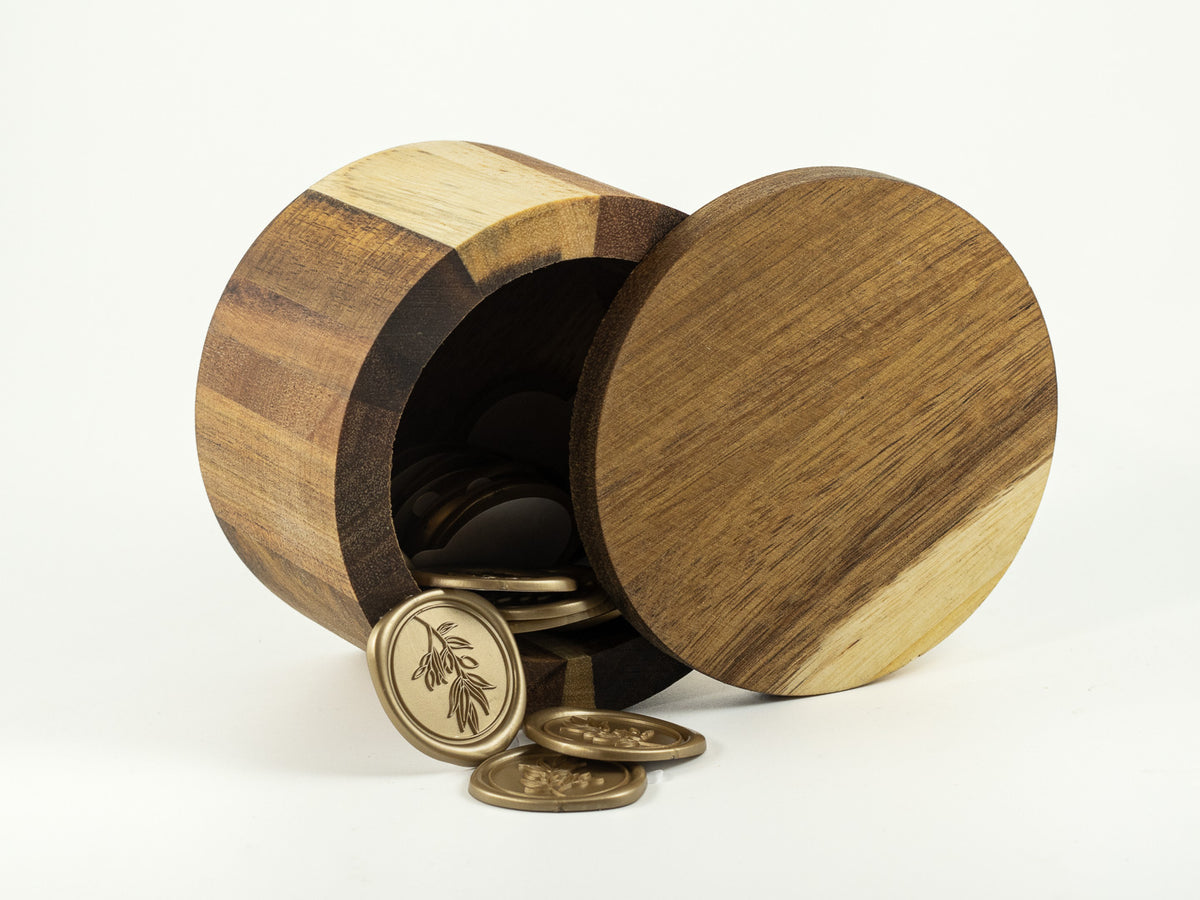 Round wooden keepsake box with bronze wax seals for The Irish Daisy Letters & Legacy gift.
