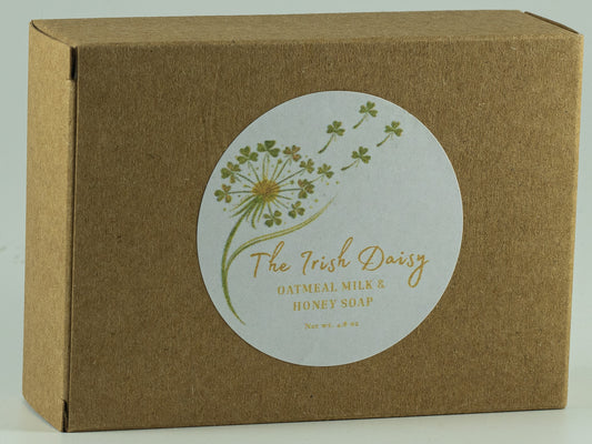 Kraft box of The Irish Daisy oatmeal milk and honey soap with botanical round label