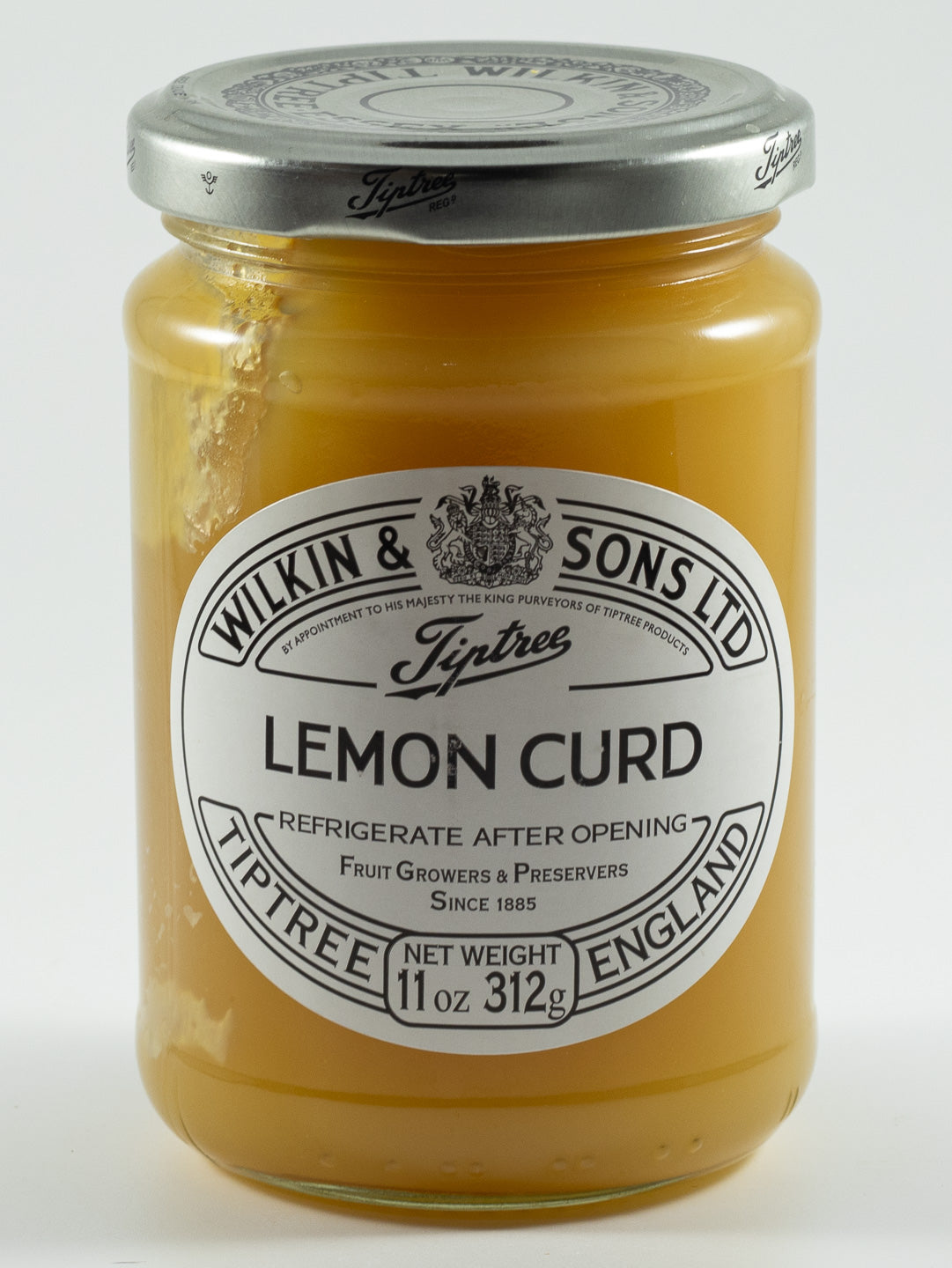 Jar of Tiptree lemon curd from England with a cream and black vintage-style label.