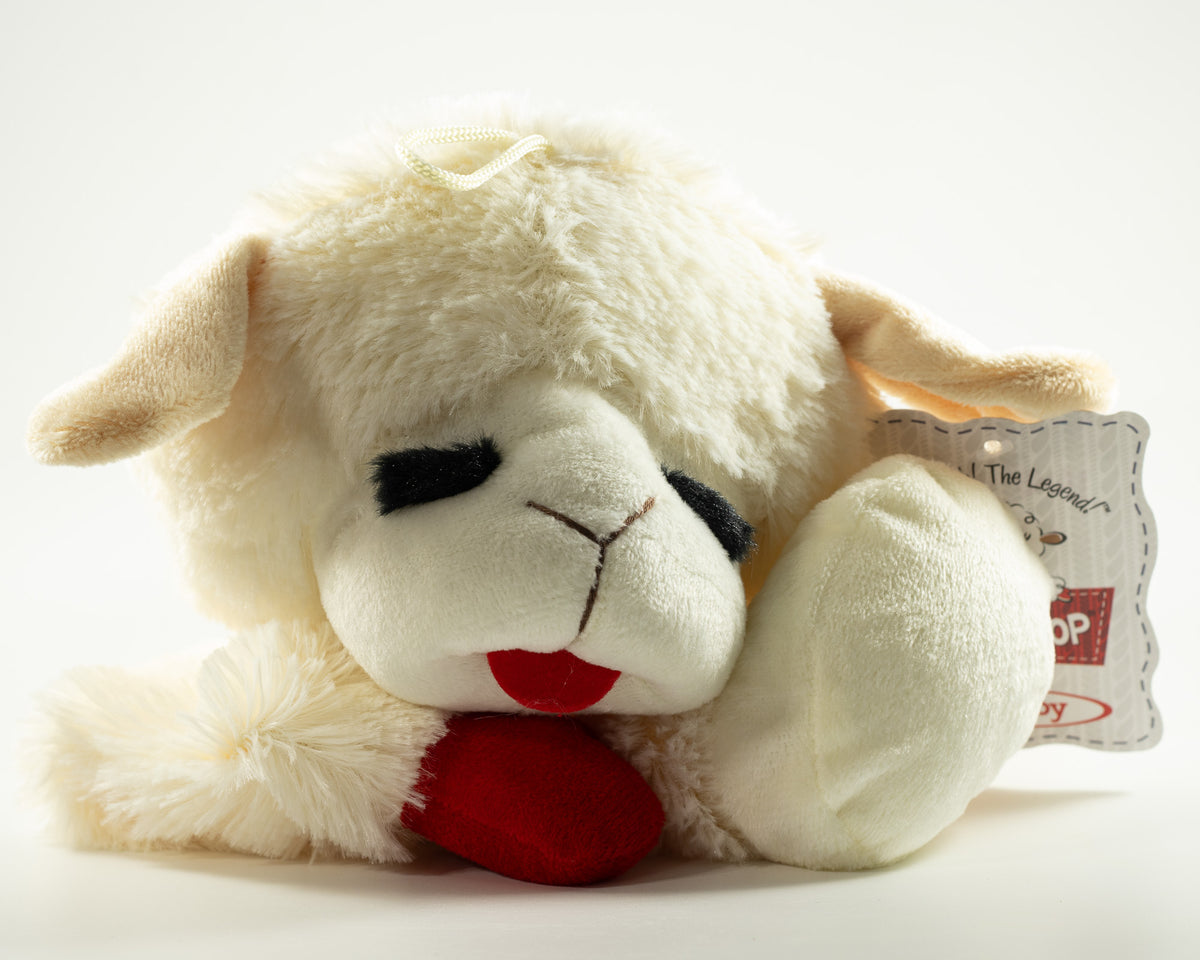 Soft plush lamb dog toy with a red heart, floppy ears, and embroidered face for cuddling and gentle play.