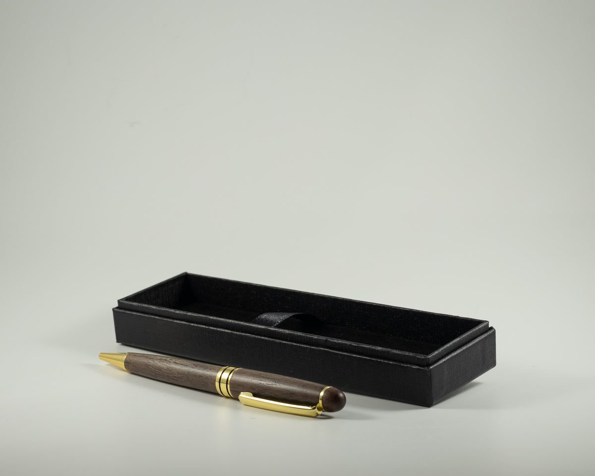 Elegant walnut wood writing pen displayed with a premium black presentation box, perfect for journaling, handwritten letters, keepsake books, and thoughtful gifts.