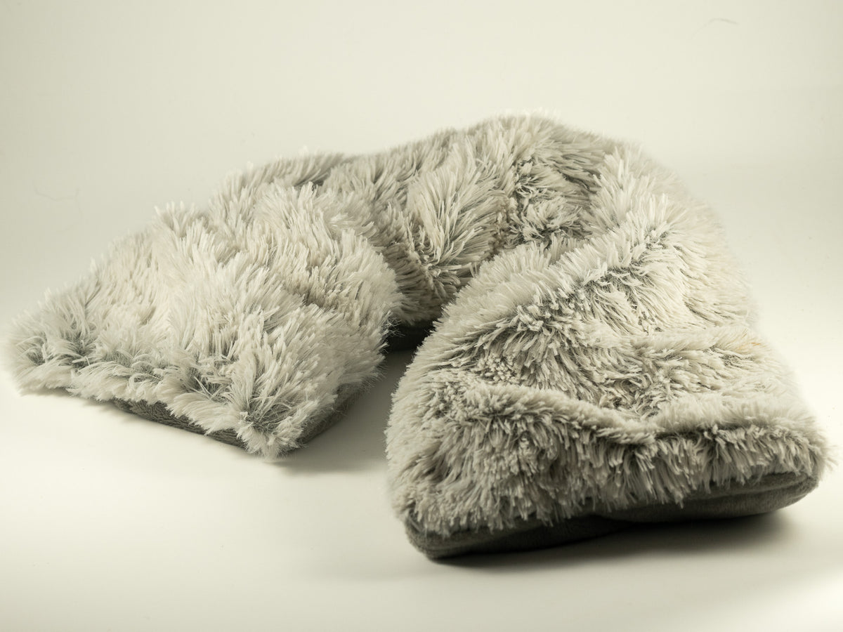 Soft plush Warmies neck wrap in a creamy neutral tone