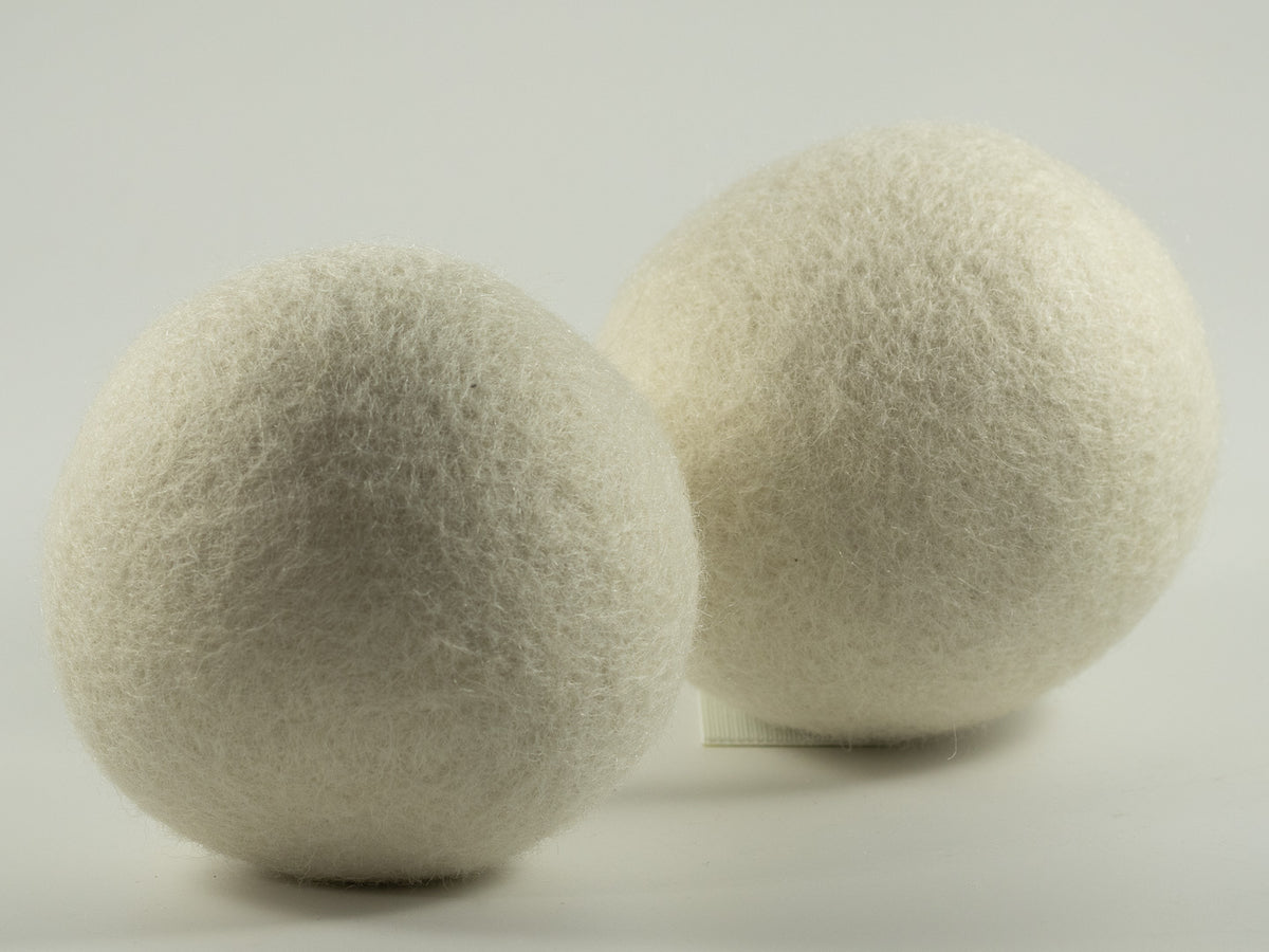 Natural wool dog play balls.